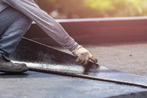 Professional Basement Waterproofing technician working in Ferrysburg, MI